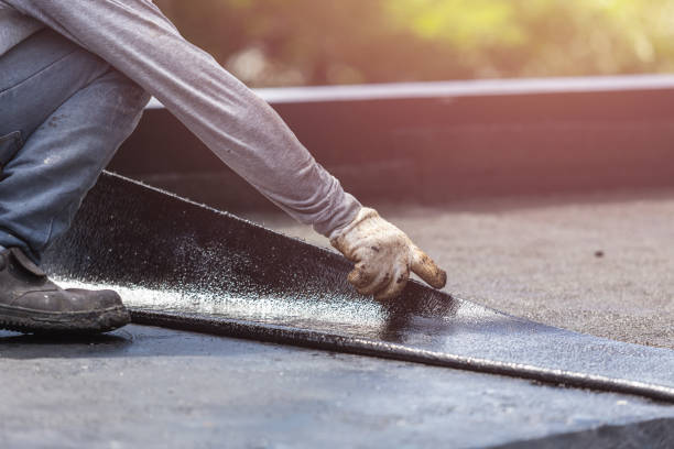 Professional Basement Waterproofing technician working in Holton, KS